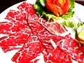 烤(kǎo)顶级肥牛(niú)
